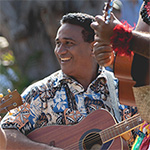 a man holding a guitar