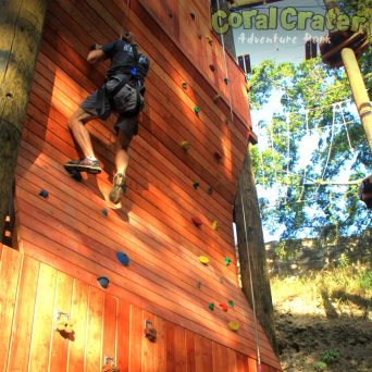 a man jumping in the air doing a trick on a skateboard