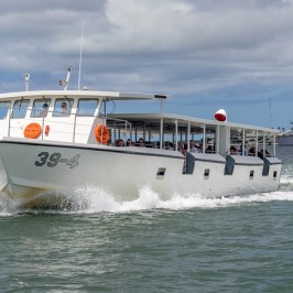 a small boat in a large body of water