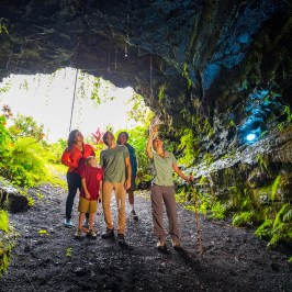 lava tube tour guide pointing