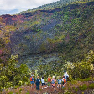 tour group overlooking crater aerial