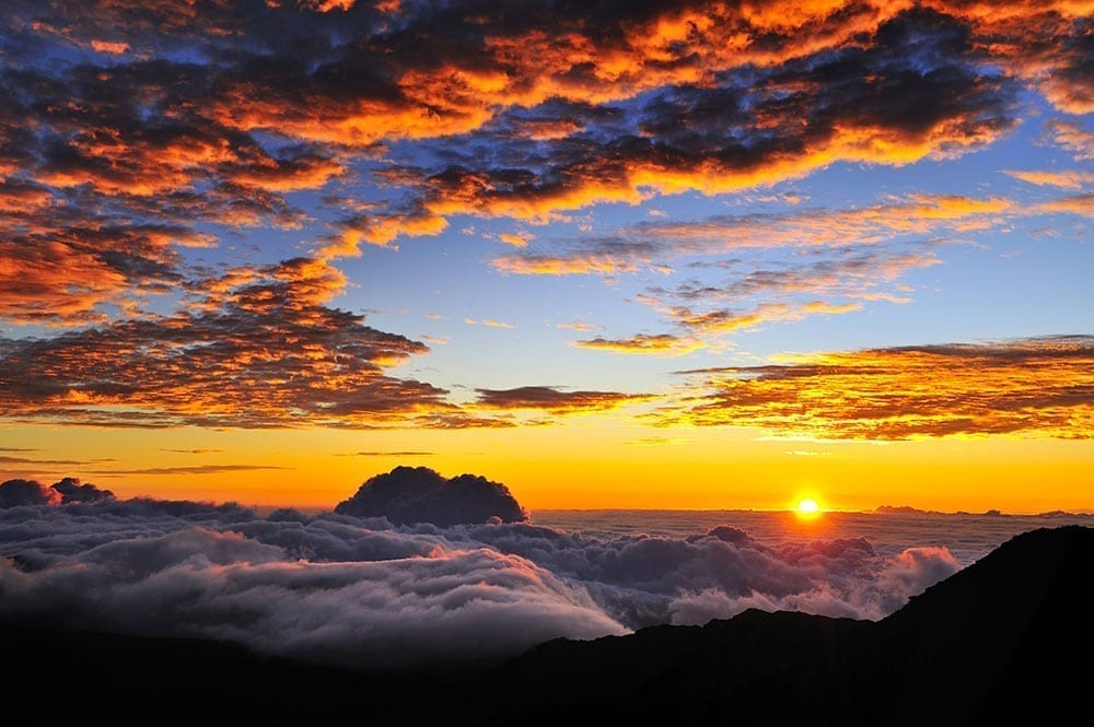 PolyAd - Haleakala Sunrise orange clouds