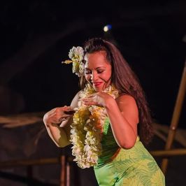 a woman holding a flower