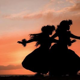 a sunset over a body of water