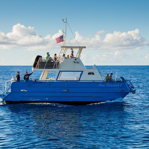 a small boat in a large body of water