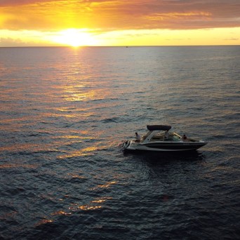 a small boat in a body of water