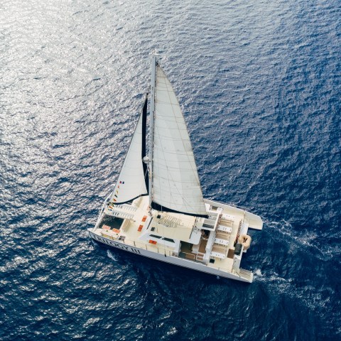 a small boat in a large body of water