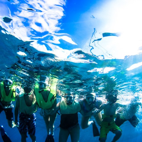 a group of people posing for the camera