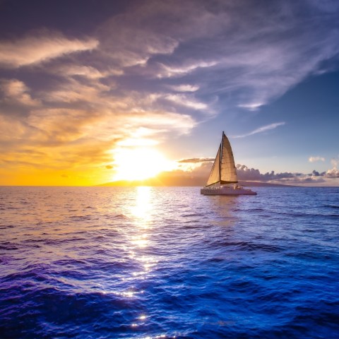 a sunset over a body of water