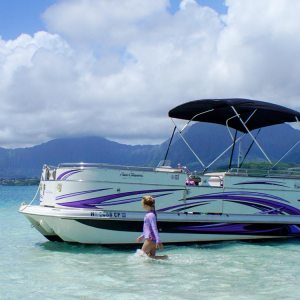 a small boat in a body of water