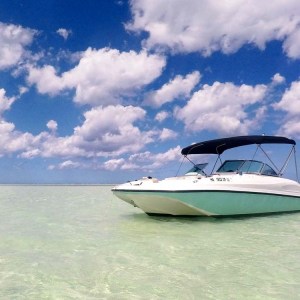 a small boat in a large body of water