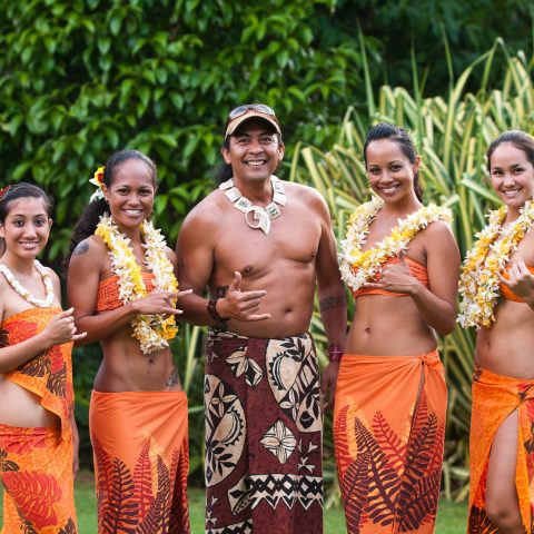 a group of people posing for the camera