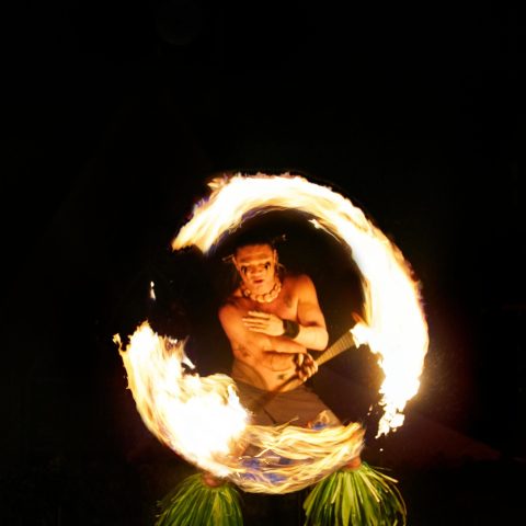 a fire burning in a dark room