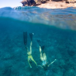 a person that is standing in the water