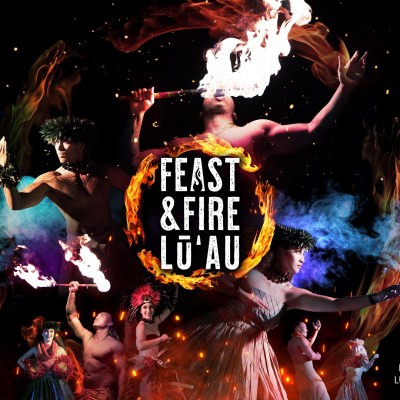 a group of people sitting around a fire