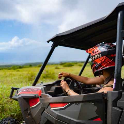 a man sitting on a motorcycle