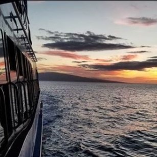 a sunset over a body of water