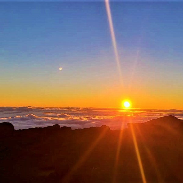 a sunset over some water