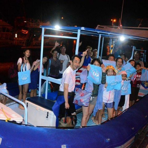 a group of people on a boat