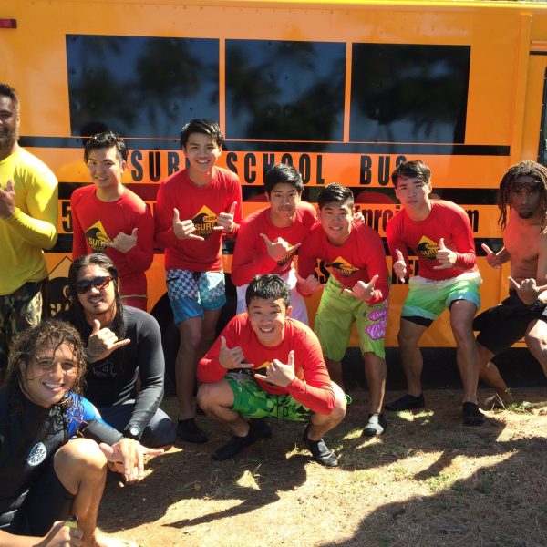 a group of people posing for the camera