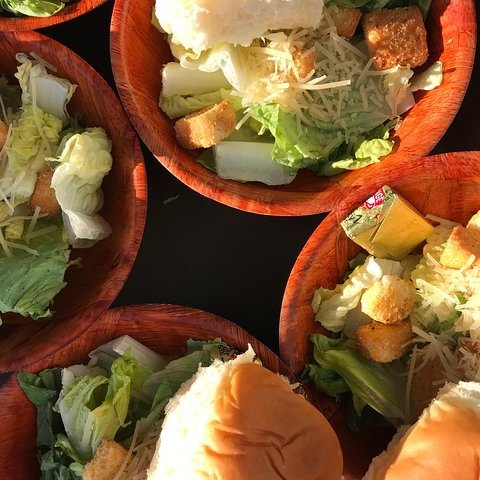 a plate of food with a sandwich and a salad