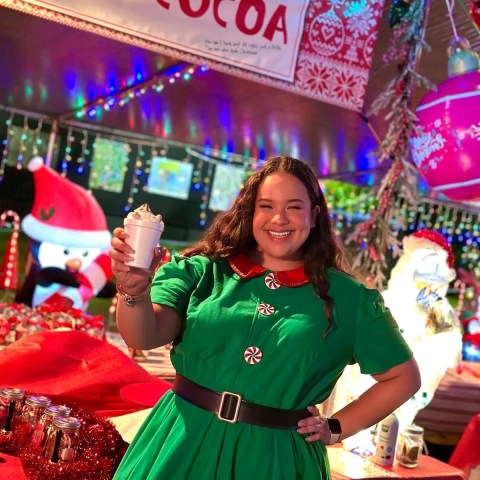 staff serving hot cocoa