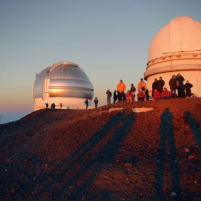 a group of people standing in front of a building