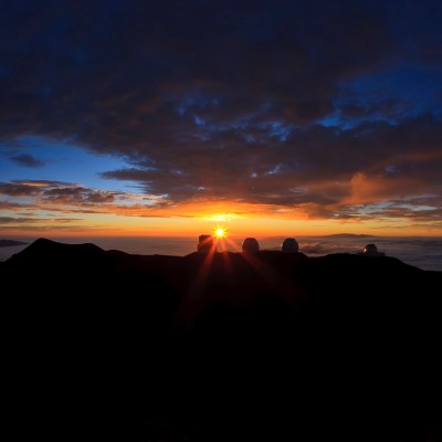 a sunset over a body of water
