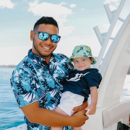 a man that is standing in the water