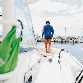 a man standing on a boat