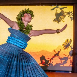 a person holding a colorful umbrella