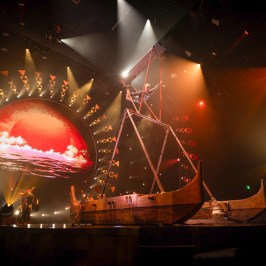 a close up of a traffic light is lit up at night