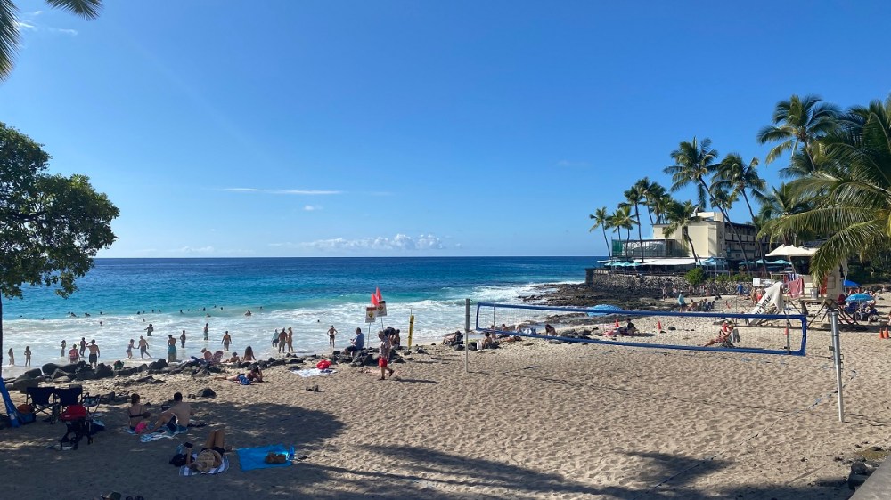 a group of people on a beach