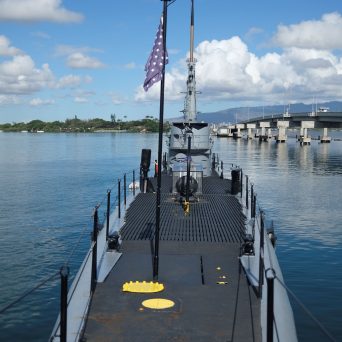 a boat is docked next to a body of water