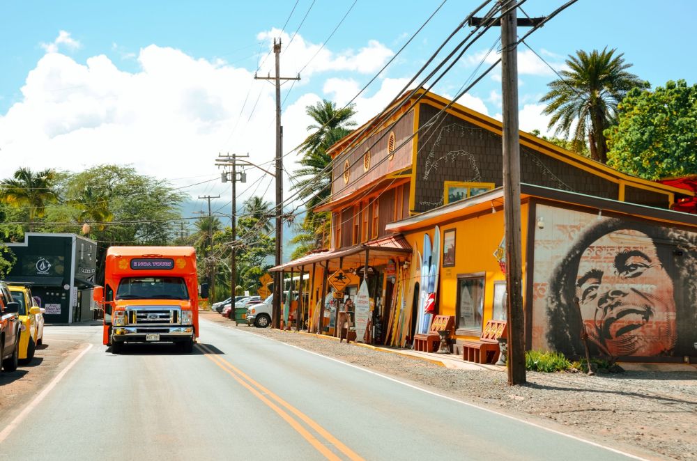 a bus driving down a street