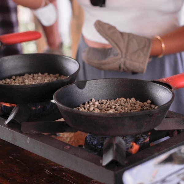 a person cooking food in a bowl