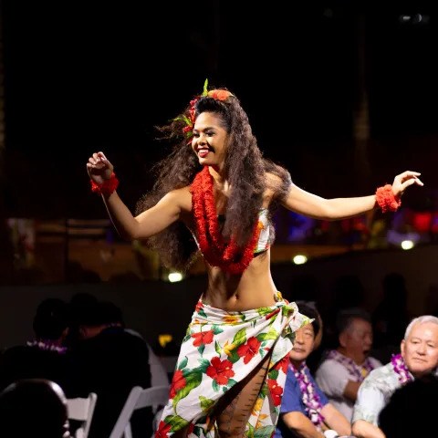 a man jumping into the air to catch a frisbee