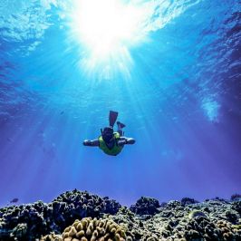 a man flying through the air on a stage