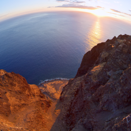 a canyon with a mountain in the background